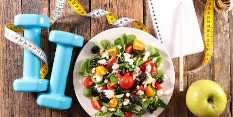 fresh salad and exercise equipment